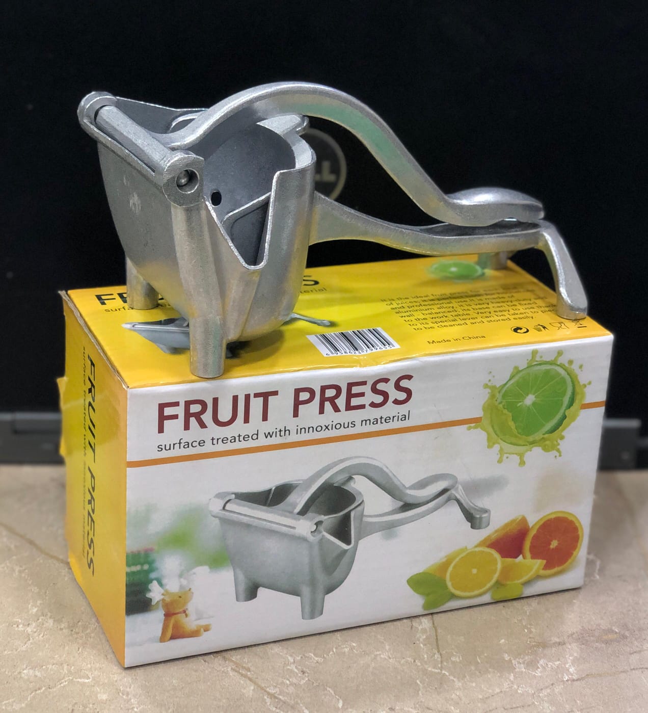 Stainless Steel Fruit Press